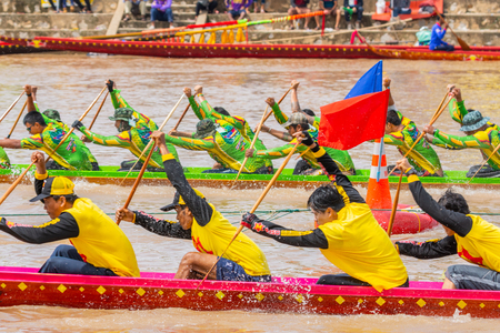 Pichit, Thailand - September 1, 2018: Annual long boat racing festival on Nan river in front of Tha Luang Buddhist temple in Pichit, Thailandのeditorial素材