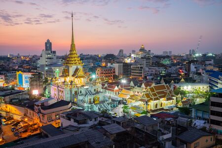 Bangkok, Thailand - November 26, 2018: Cityscape of Bangkok at Wat Trimitr, Buddhist temple, area in Bangkok, Thailandのeditorial素材