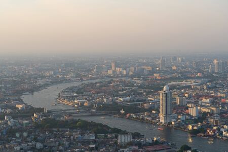 Bangkok, Thailand - December 24, 2018: City of Bangkok  where is the capital city of Thailand covering with air pollution creating unclear scene and unhealthy during twilightの写真素材