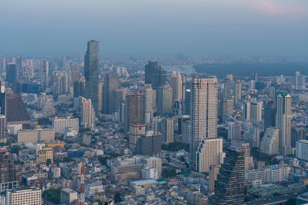 City of Bangkok  where is the capital city of Thailand covering with air pollution creating unclear scene and unhealthy during twilightの写真素材