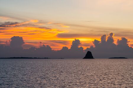 Beautiful view of sea and colorful sky and clouds during sunset in sunny dayの写真素材