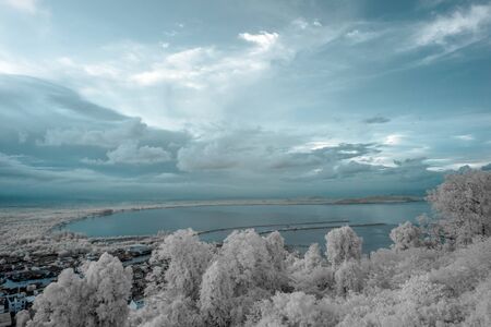 Aerial view of Chumphon city in provincial of Thailand taken from Mutsea view point  in infrared photographyの写真素材