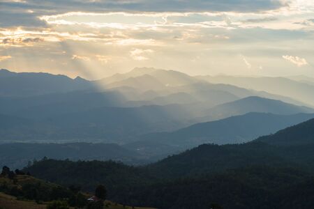 Sunlight ray shining on beautiful rice terraces during sunset in Pa Bong Piang village in Chiangmai, Thailandの写真素材