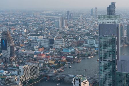 City of Bangkok  where is the capital city of Thailand covering with air pollution creating unclear scene and unhealthy during twilightの写真素材