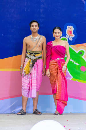 Phichit, Thailand - December 29, 2018: Beautiful girl and smart boy models in collection of Thai traditional costume in the event of promoting tourism open for public in Phichit, Thailandのeditorial素材