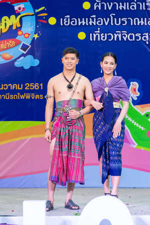 Phichit, Thailand - December 29, 2018: Beautiful girl and smart boy models in collection of Thai traditional costume in the event of promoting tourism open for public in Phichit, Thailandのeditorial素材