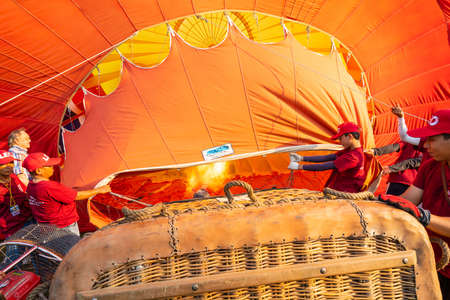 Chiangrai, Thailand - February 15, 2019: Exhibitors preparing balloon to fly in International Balloon Festival 2019 at Singha park in Chiangrai, Thailandのeditorial素材