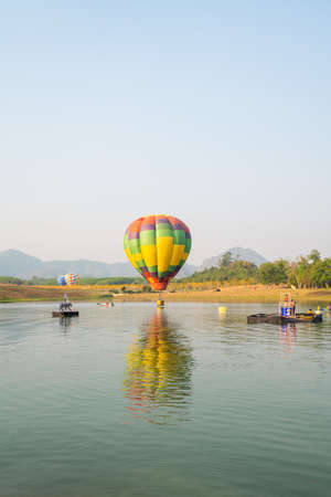 Chiangrai, Thailand - February 15, 2019: Unidentified many on people on boat enjoying International Balloon Festival 2019 at Singha park in Chiangrai, Thailandのeditorial素材