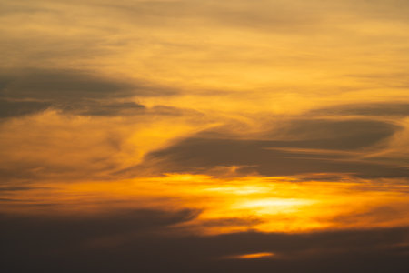 Sunset sky with clouds background,sunset sky with clouds and sunの写真素材