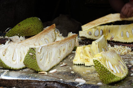 Sliced ripe jackfruit on the counter at a local market of fruit and vegetable in Sri Lanka