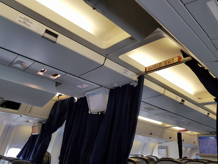 Ceiling of the plane. Interior cabin of a passenger planeのeditorial素材