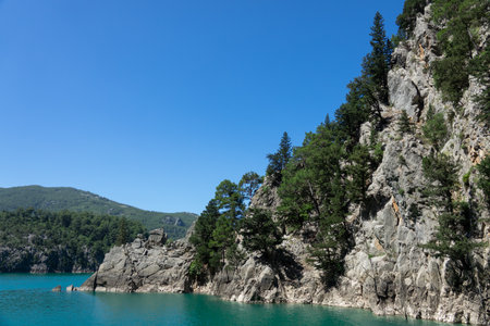 View of the lake with clear turquoise water and on the mountain cliffs of the Green Canyon. Landscape of Green canyon, Manavgat, Antalya, Turkeyの写真素材