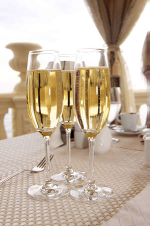 glasses of champagne on wedding tableの写真素材