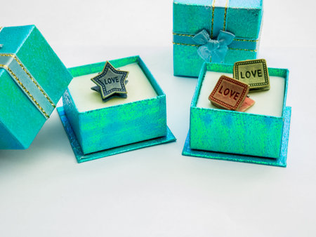 Small gift boxes is beautiful colors and cute paper clips.の写真素材