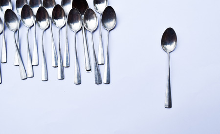 stainless spoon on white backgroundの写真素材