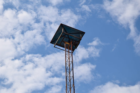 Villege broadcast tower with sky background