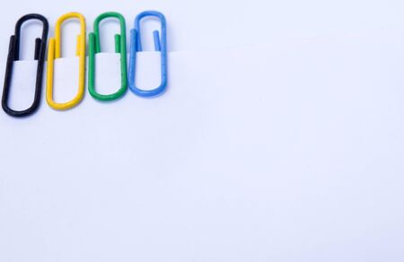 Collection of colorful paper clips with space for textureの写真素材