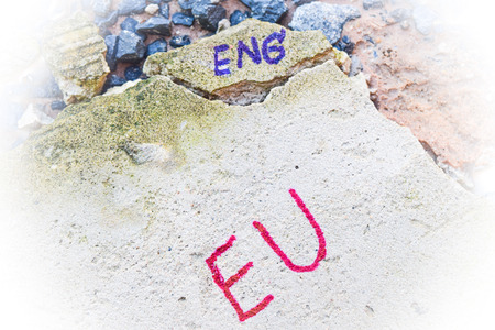 Brexit UK EU referendum concept with word UN and Eng on stone wallの写真素材