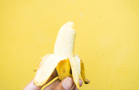 banana on yellow backgroundの写真素材