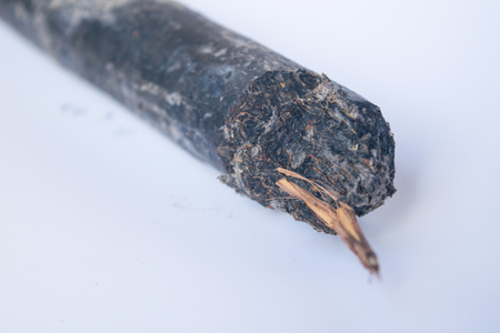 The logs of fire wood isolated on white in Thailandの写真素材