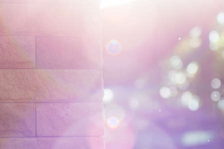 Brick wall with beautiful sunlight and bokehの写真素材