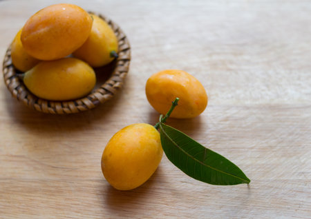 Plango, sweet marian plum thai fruit on wooden background