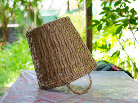 empty wicker basket on tebleの写真素材