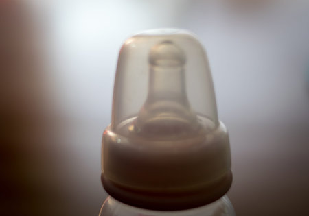 close up bottle of baby milk
