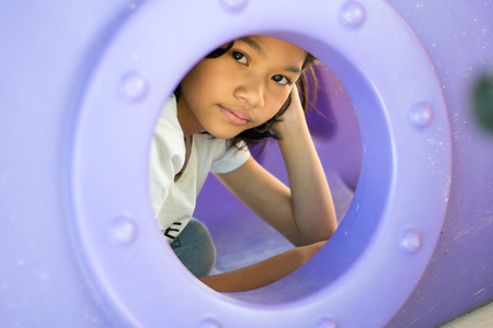 close up girl child in playgroundの写真素材