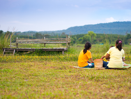 family picnic on mountain viewの写真素材