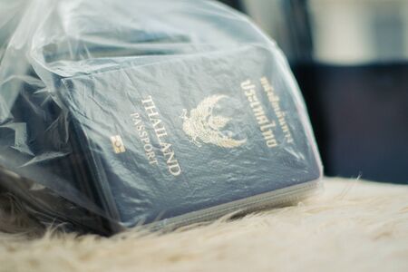 group of thai passport in plastic bag for travel groupの写真素材