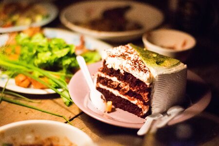 cake on birthday party tableの写真素材