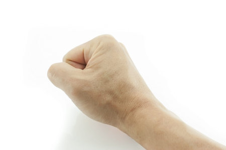 Male fist on white background