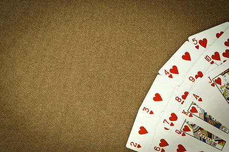 Heart Cards 13 cards on the table brown plywood boardsの写真素材