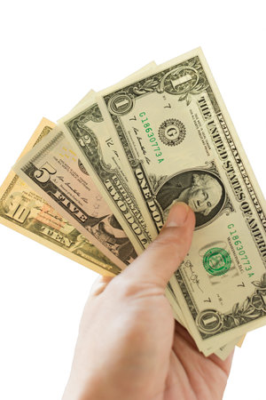 hand and dollars on white background.