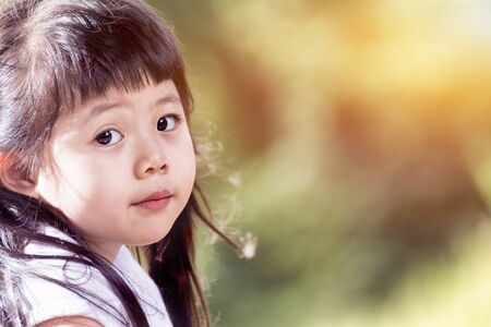 Cute Asian baby Smiling on nature background.の写真素材