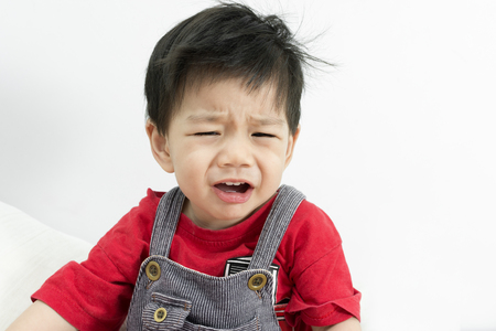 Asia Baby Boy Cry on white background.の写真素材