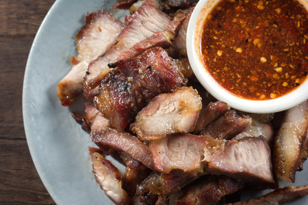 Charcoal-boiled Pork Neck with the Sauce is Spicy Sour Taste is a Popular Appetizer in Thailand.の写真素材