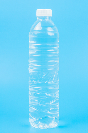 Close up Bottle of drinking water. on Blue Background.の写真素材