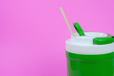 Cold water and drinking straws. with space for text. Reduce the use of plastic water (PET) bottles concept. These can be used several times without wasting natural resources and reducing global warming.の写真素材
