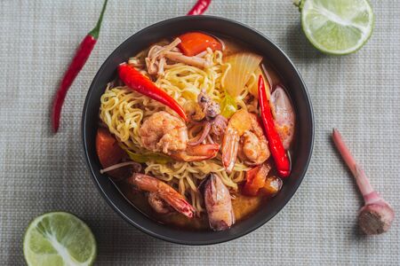 Top View of Mama Tom Yum Shrimp with Seafood Has a spicy and sour taste that is popular in Thailand.の写真素材