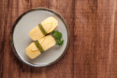 Top View of Sweet Egg Omelet Tamagoyaki Nigiri Sushi with copy space for your text.の写真素材