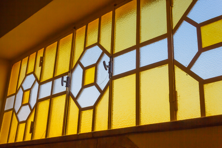 a series of coloured glasses form a geometric compositionの写真素材