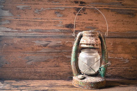 old lantern vintage on the woodenの写真素材