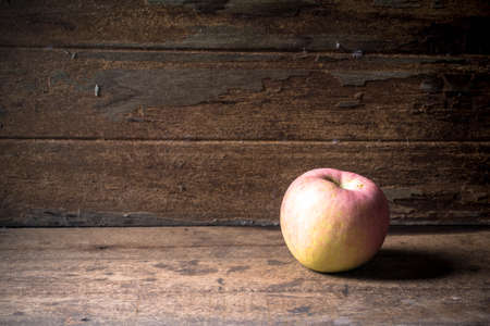 apple on woodenの写真素材