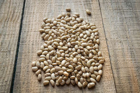 roasted soybeans on wooden backgroundの写真素材