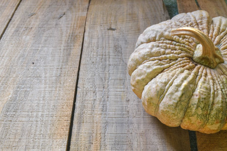 pumpkin on wooden backgroundの写真素材