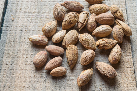 almonds in wooden background