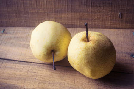 Asian pear on woodenの写真素材