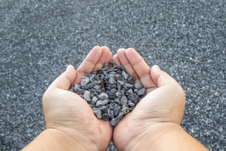 crushed stone in hand